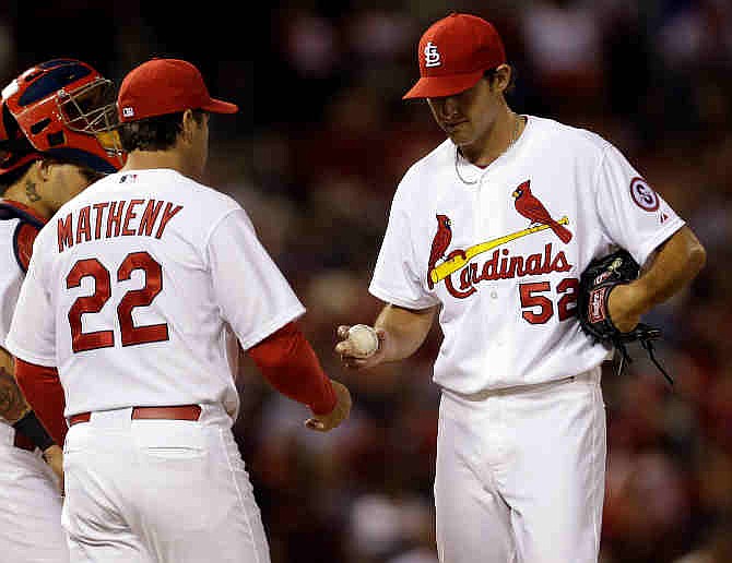 St. Louis Cardinals starting pitcher Michael Wacha, right, is pulled out of a baseball game by manager Mike Matheny during the fifth inning against the Arizona Diamondbacks Tuesday, June 4, 2013, in St. Louis.