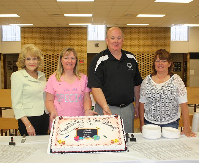 Those honored at a retirement celebration recently at Cole County R-V Schools, include from left, Dianne Passmore, Doris Schulte, Mark Blythe and Debbie Luebbering. 