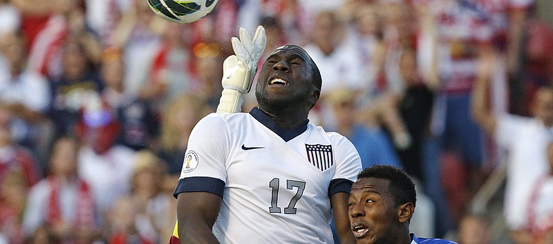 Jozy Altidore of the United States (center) heads the ball as Honduras' Jose Velasquez defends during Tuesday's game in Sandy, Utah.