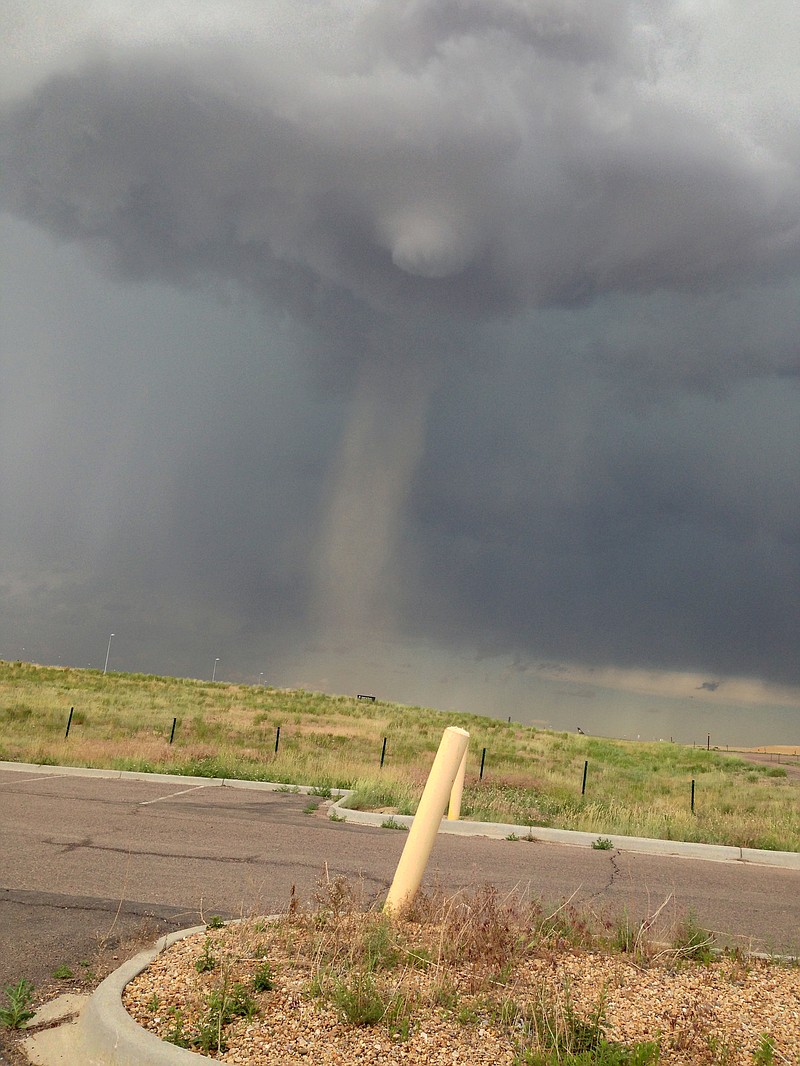 A tornado that touched down near Denver International Airport was captured in Denver, Colo.