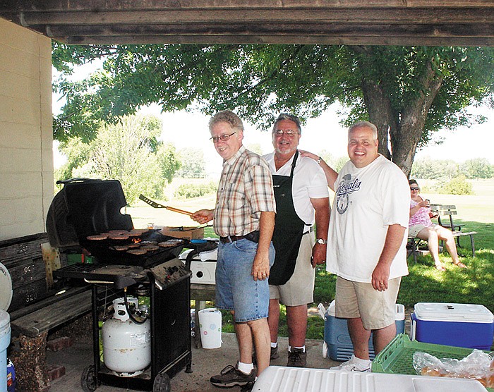 From left are Brad Baer, Charlie Roll and Dwight Sanders, helping with the barbecue at the Ninth Annual California Area Chamber of Commerce Golf Tournament Wednesday afternoon at the California Country Club.  