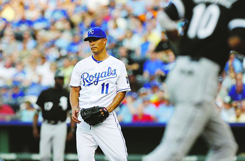 Royals starting pitcher Jeremy Guthrie gets a new ball after walking in the White Sox's Alexei Ramirez during the first inning of Friday's game in Kansas City.