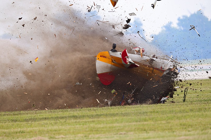 A stunt plane with a wing walker crashes Saturday during a performance at the Vectren Air Show in Dayton, Ohio. The crash killed the pilot and the wing walker instantly, authorities said.