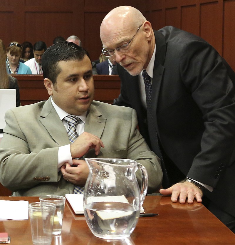 George Zimmerman, left, speaks with his attorney Don West during his trial Tuesday in Seminole County circuit court in Sanford, Fla. Zimmerman has been charged with second-degree murder for the 2012 shooting death of Trayvon Martin.