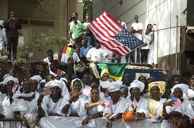 People lined the motorcade route of U.S. President Barack Obama on his way to meet with Senegalese President Macky Sall at the Presidential Palace on Thursday, in Dakar, Senegal. Obama is visiting Senegal, South Africa and Tanzania on a week long trip.