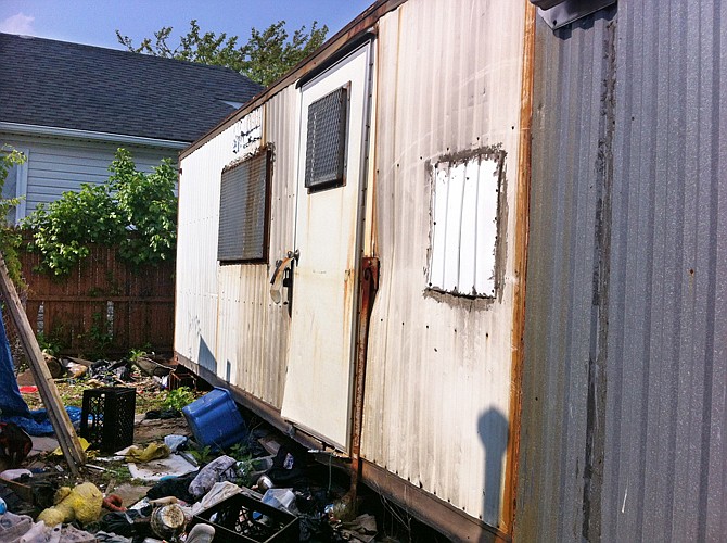 A dilapidated trailer sits parked in a trash strewn lot in the Queens borough of New York. Thought to be vacant, the trailer went unsearched after Superstorm Sandy flooded the area in late 2012. More than five months after the storm, the partially skeletonized remains of 62-year-old Keith Lancaster were found inside.