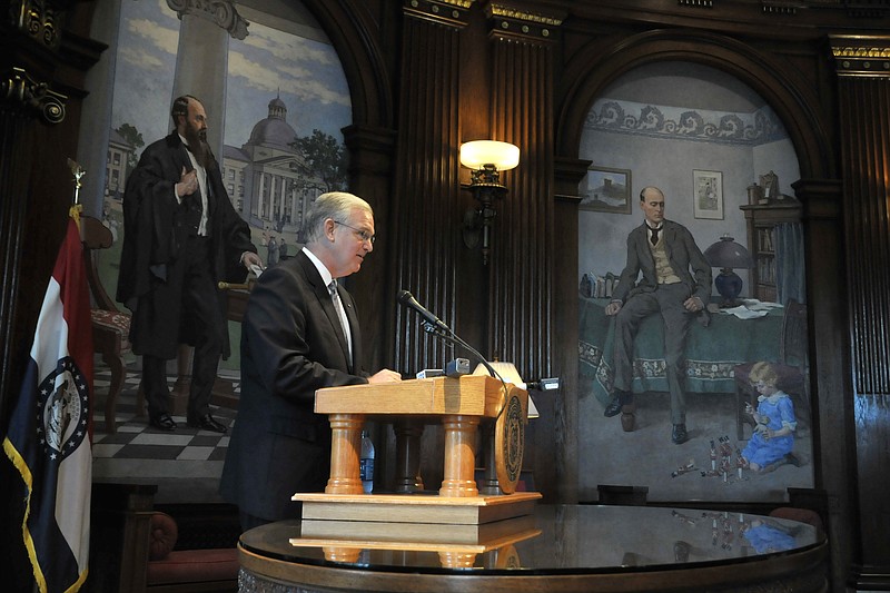 Gov. Jay Nixon speaks at a press conference Friday in his Missouri Capitol office in Jefferson City. Citing projected costs of House Bill 253, Nixon announced he was withholding $400 million from the Fiscal Year 2014 budget. 