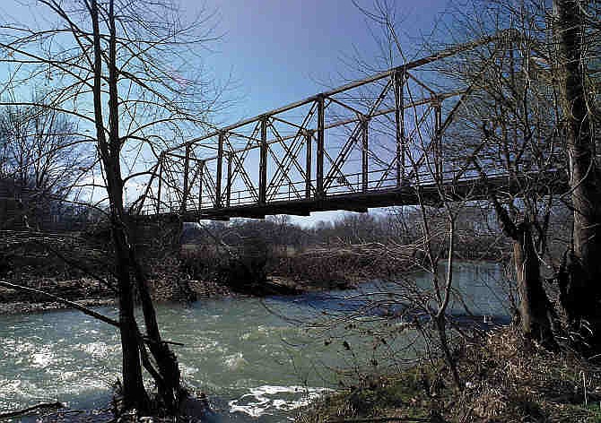  In a Feb. 19, 2001 file photo a one-lane bridge crosses the White River outside of Fayetteville, Ark. Amid a public backlash, several conservation groups and state agencies no longer want the White River to be part of the National Blueway.