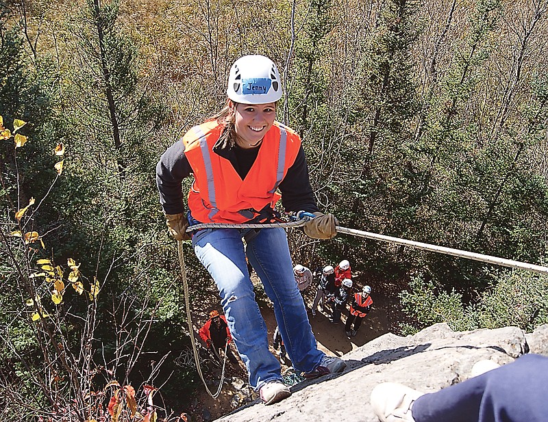 Boy Scouts' Venturing crew member Jenny Welles prepares to rappel at Bear Paw Scout Camp in Mountain, Wis. For the first time, members of Venturing crews, including girls, will be allowed to participate in the Boy Scouts national jamboree. being held in mid-July in Glen Jean, W.Va. (AP Photo/Tammy Welles)