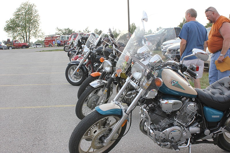 Enthusiasts peruse a line of motorcycles that had just returned from the inaugural Hope-Fest parade last year. This year marks the return of Victory Fellowship Church of Fulton's fundraiser, which raises funds to send food and other resources to help Haiti.