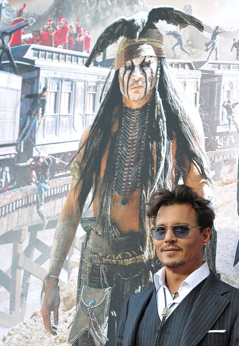 Johnny Depp attends the world premiere of "The Lone Ranger" Saturday at Disney California Adventure in Anaheim, Calif. The Golden Globe-winning actor plays iconic Native American, Tonto, in the upcoming Disney reboot opening today.