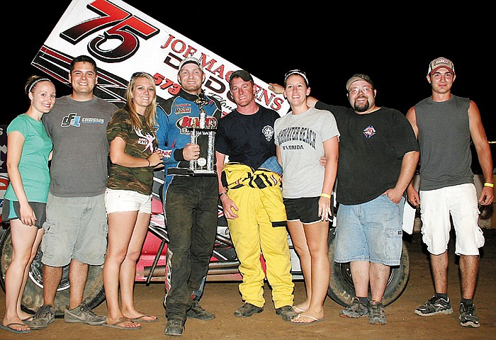 California's Tyler Blank celebrates his first victory of the 2013 season in the Winged Sprint division at the Double-X Speedway Sunday night. 