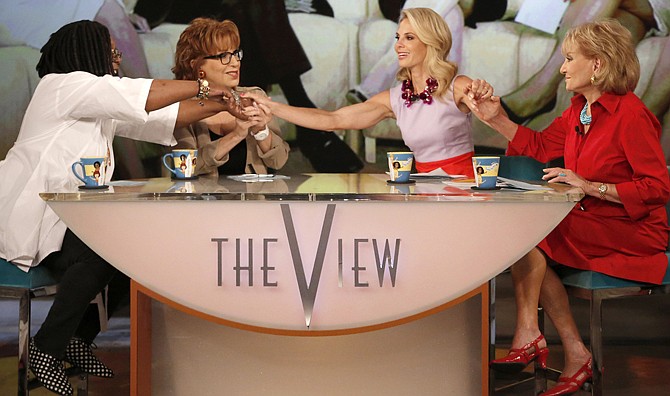 Whoopi Goldberg, Joy Behar, Elisabeth Hasselbeck and Barbara Walters, co-hosts on "The View," are seen Wednesday during Hasselbeck's last day on the daytime talk show.