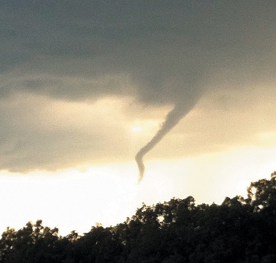 Josh Allen, who lives just south of McGirk in Moniteau County, spotted a possible funnel cloud around 5:30 p.m. Wednesday, July 3, and snapped this picture. "I took it right in front of my house. It was just over the tree line. I'd say it was pretty close to being right over California." 