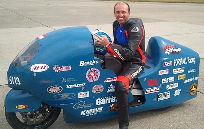 Bill Warner, shown here in a 2011 photo, died Sunday at an annual speed trial event in northern Maine. The 44-year-old lost control and crashed while trying to top 300 mph.  