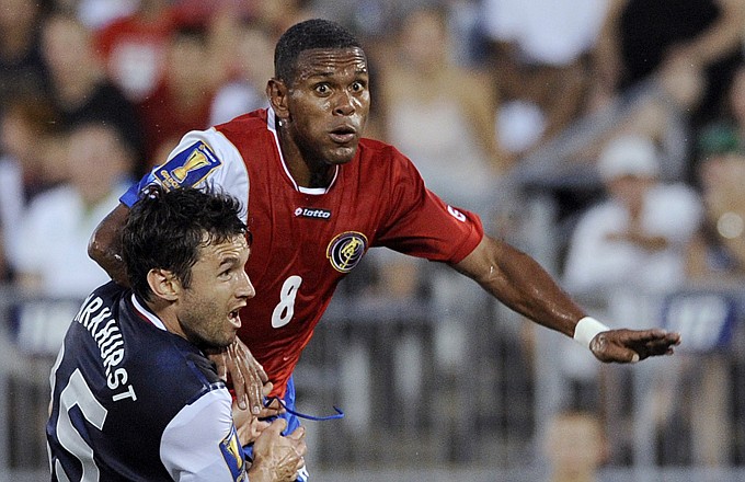 Michael Parkhurst of the United States and Costa Rica's Kenny Cunningham battle for the ball during the first half of Tuesday's match in East Hartford, Conn.