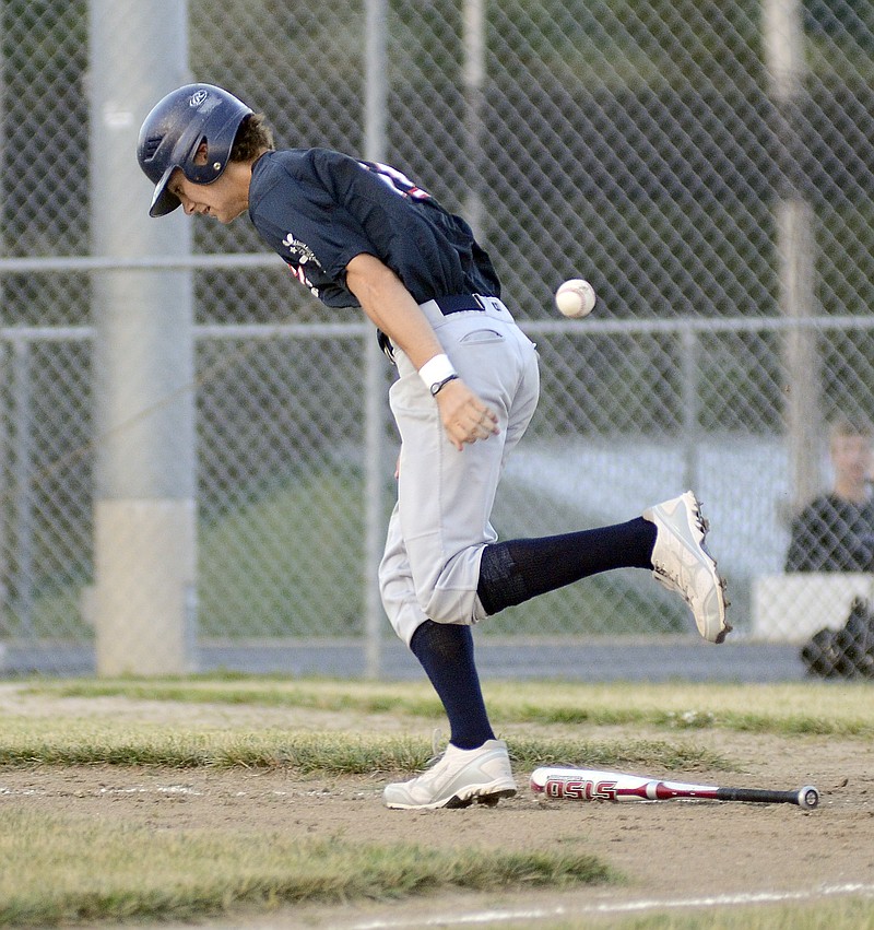 Logan Bax of Jefferson City American Legion Post 5 takes off for first base ahead of his batted ball during the fourth inning of Thursday night's district tournament game against Fulton at the American Legion Sports Complex.