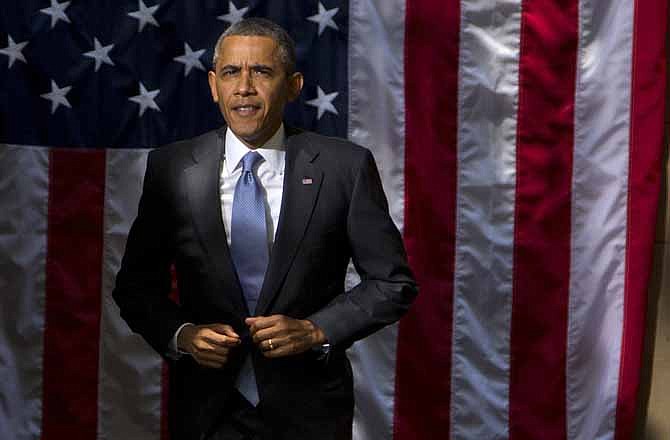 In this June 25, 2013 file photo, President Barack Obama arrives to make a speech at Georgetown University on in Washington. 