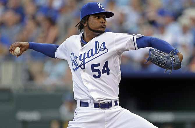 Kansas City Royals starting pitcher Ervin Santana throws during the first inning of a baseball game against the Detroit Tigers, Friday, July 19, 2013, in Kansas City, Mo.