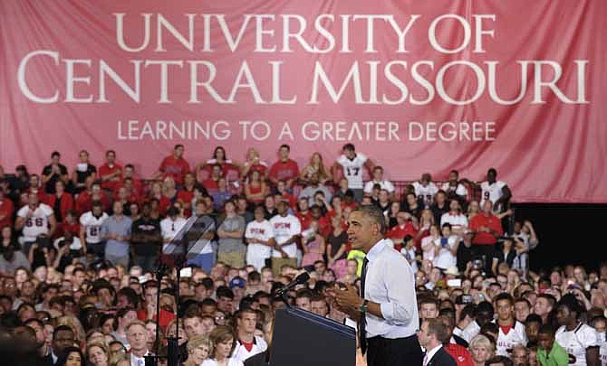President Barack Obama speaks at the University of Central Missouri in Warrensburg, Mo., Wednesday, July 24, 2013. Obama hit the road to deliver remarks in Illinois and Missouri kicking off a series of speeches that lay out his vision for rebuilding the economy.