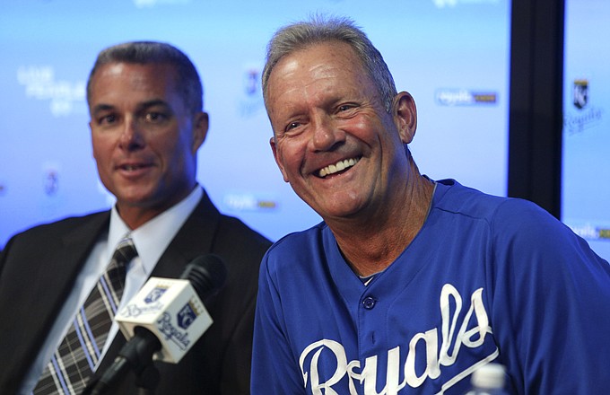 Royals interim batting coach George Brett talks with members of the media as he announces he is resigning from the position as general manager Dayton Moore looks on Thursday in Kansas City. Brett will continue as president of baseball for the team and Pedro Grifol will take over as full-time hitting coach.