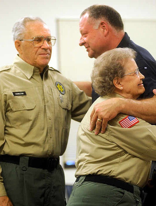 Cole County Sheriff Greg White gives a heartfelt thank you to Larry and Anita Hamilton during their retirement ceremony from the Cole County Posse. 