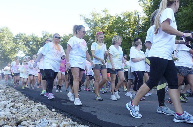 A record 650 men, women and children took part in the Relay for Life What's Your Color 5K Run/Walk in the Osage Beach City Park at Lake of the Ozarks.