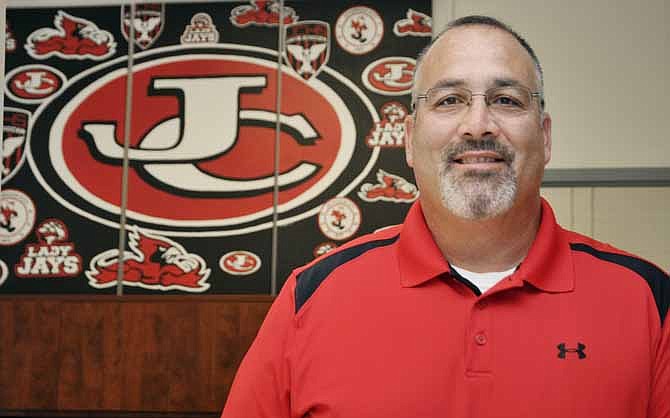 Jefferson City High School's new activities director, Mark Caballero, is getting acclimated to his job after taking over earlier this month.