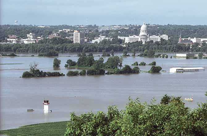 As seen in this News Tribune file photo, flooding set record levels along the Missouri River in the summer of 1993, including the 38.65-foot crest at Jefferson City on July 30 and 31.