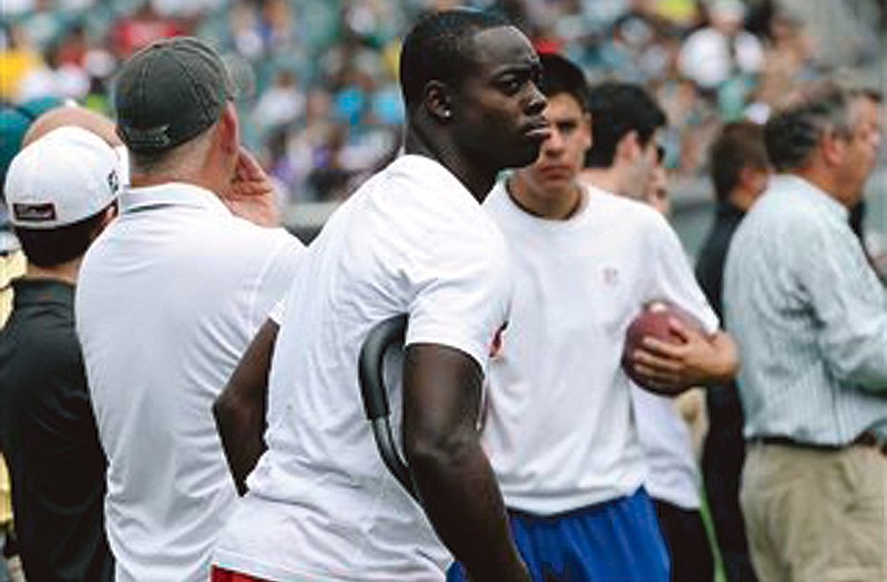 Eagles receiver Jeremy Maclin watches practice Sunday in Philadelphia.