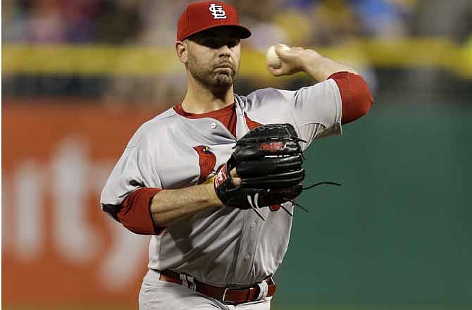 St. Louis Cardinals relief pitcher Marc Rzepczynski (34) delivers during the sixth inning of a baseball game against the Pittsburgh Pirates in Pittsburgh Monday, July 29, 2013. 