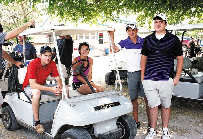 Participants of the Lady Pintos Hoops Association Golf Tournament cool off in the shade while the remaining teams finish  July 19 at the California Country Club.