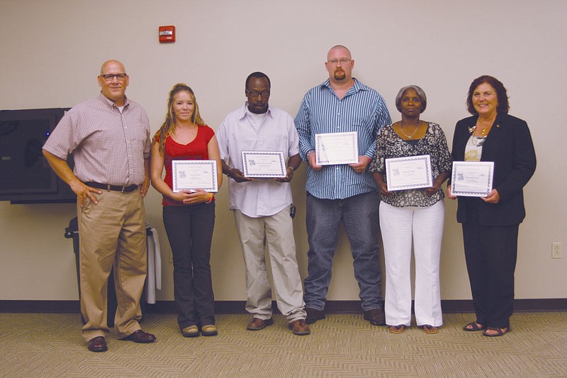 From left, Callaway Community Organizer Tad Dobyns poses with the 2013 Step Up to Leadership graduates: Tonya Smith, Demetrias Herndon, Jerry Damron, Mary Kay Glover and Sheryl Olson. Not pictured: graduate Devon Moser.