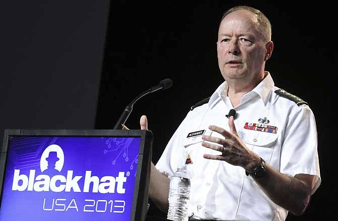 Army Gen. Keith Alexander, head of the National Security Agency, delivers a keynote address at the Black Hat hacker conference on Wednesday, July 31, 2013, in Las Vegas. 