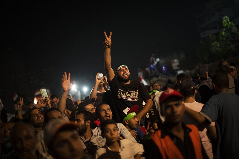 Supporters of Egypt's ousted President Mohammed Morsi chants slogans Friday against Egyptian Defense Minister Gen. Abdel-Fattah el-Sissi during protest in Nasr City, Cairo.