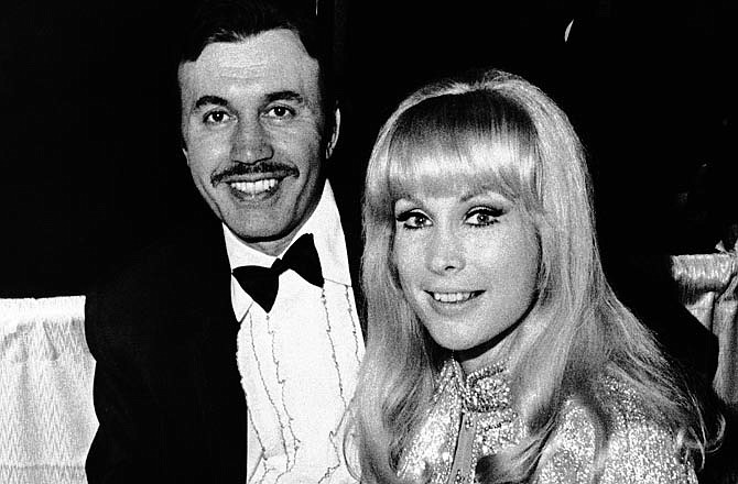 In this Jan. 21, 1969 file photo, Michael Ansara and Barbara Eden were among several Hollywood couples at the Inaugural Ball in the Sheraton Hotel Ballroom, in Washington. A longtime friend and spokesman for Ansara says the actor died Wednesday, July 31, 2013, at his home in California after a long illness. He was 91.
