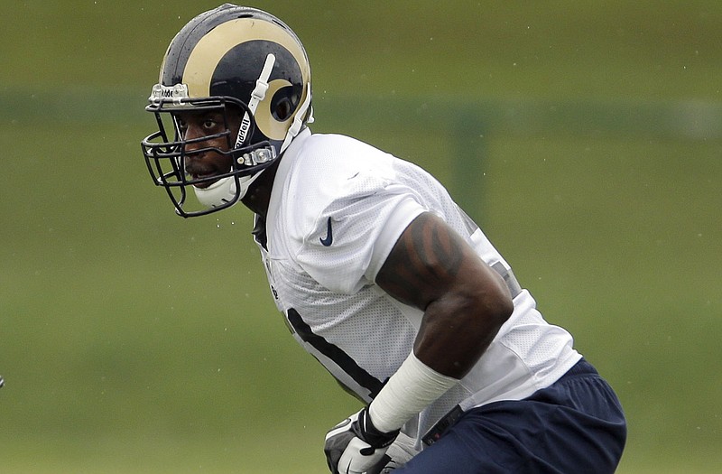 St. Louis Rams linebacker Will Witherspoon takes part in a drill during training camp Friday in St. Louis.