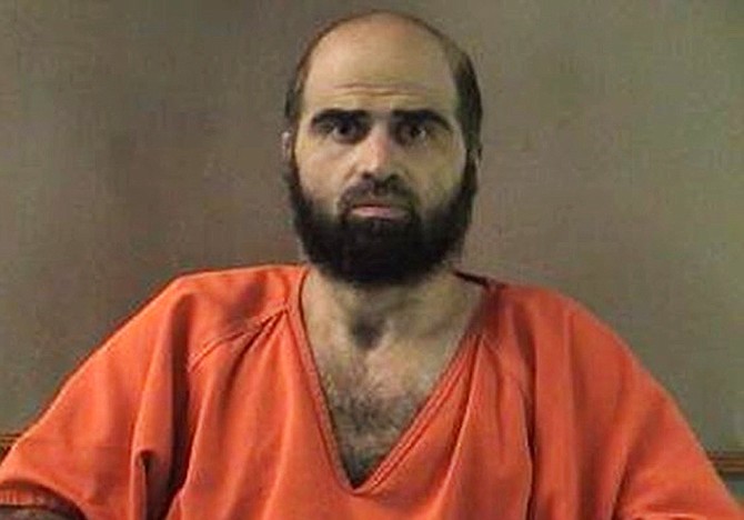 This undated file photo provided by the Bell County Sheriff's Department shows Nidal Hasan, who is charged in the 2009 shooting rampage at Fort Hood that left 13 dead and more than 30 others wounded.