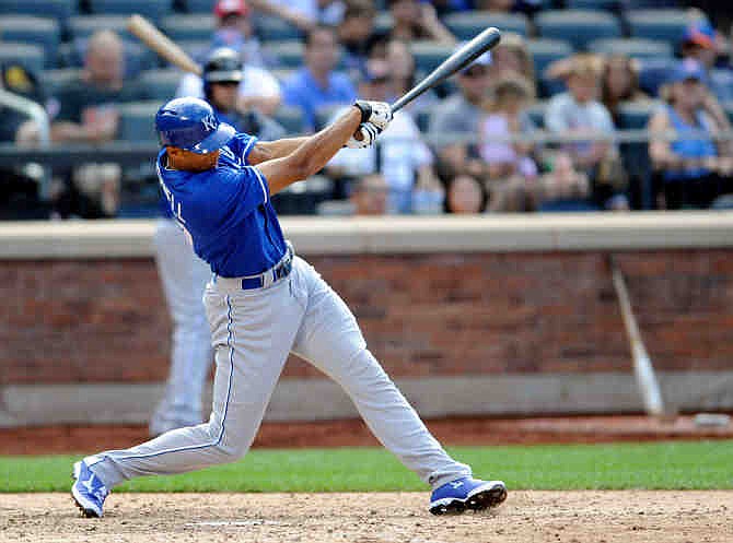 Kansas City Royals pinch Hitter Justin Maxwell hits a home run during the 12th inning of an interleague baseball game against the New York Mets Saturday, Aug. 3, 2013 at Citi Field in New York.