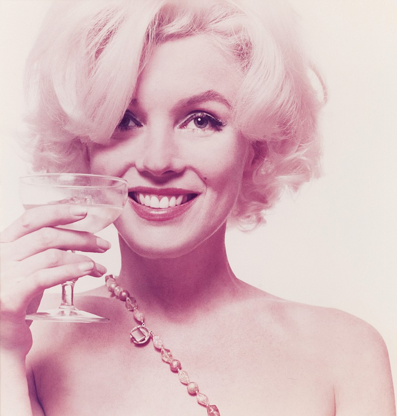 This 1962 photo provided by Freeman's auction house in Philadelphia shows one of a limited-edition portfolio of 10 photos of Marilyn Monroe that is scheduled to go on the block Sept. 10. The photos were made from fashion photographer Bert Stern's original negatives from his June 1962 assignment for Vogue.