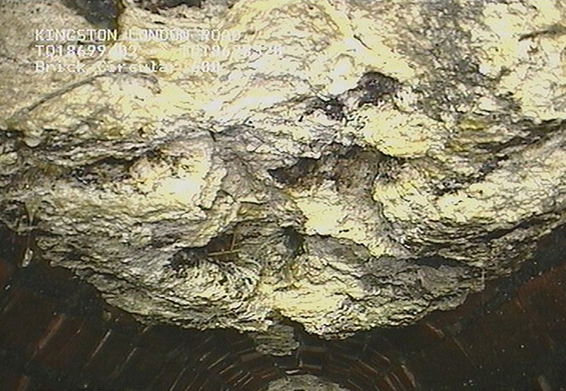 Part of a 15-ton lump of fat and other debris coagulated inside a main London city sewer, which took many days to clear from the drain, it was announced Tuesday. Utility company Thames Water says it has cleared what it calls the biggest "fatberg" ever recorded in Britain, a 15-ton blob of congealed fat and baby wipes the size of a bus.
