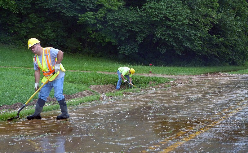 In Tuscumbia, water from the Osage River was a few feet from the roadway before the dam's floodgates opened. On Route 17 west of Tuscumbia, Saline Creek was also flooded. Missouri Department of Transportation (MoDOT) employees assisted in excavating ditches and trying to control run off that was filtering water, mud and debris over Missouri Highway 17. 