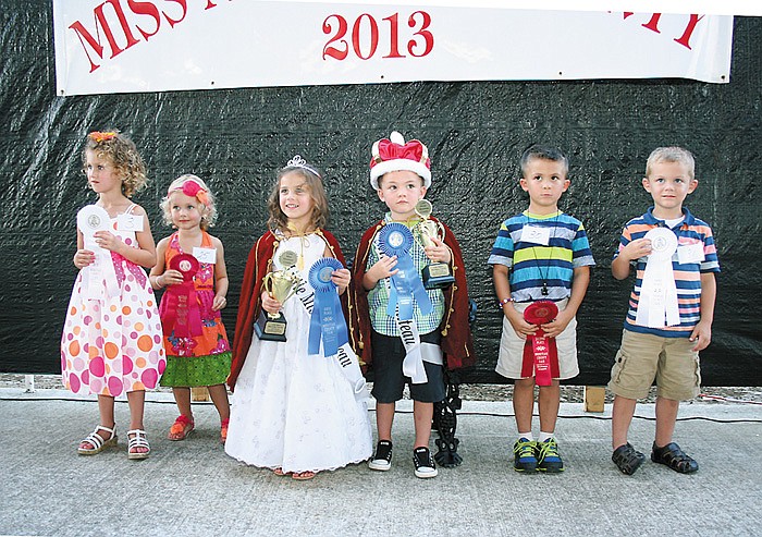 Jaxon Scrivner and Ada Cassil crowned 2013 Little Mr. and Miss Moniteau County
Jaxon Scrivner, 4, and Ada Cassil, 3, center, were crowned the 2013 Little Mr. and Miss Moniteau County Tuesday, Aug. 6, at the Moniteau County Fair, California. Jaxon is the son of Aaron and Andrea Scrivner, California, and Ada is the daughter of Kaylan Cassil and Mary Betteridge, Jamestown. At left, from left, are second runner-up for Little Miss Moniteau County Nikaylee Hays, 4, daughter of Nick and Kim Hays, California, and first runner-up Nola Schanzmeyer, 4, daughter of Ryan and Johnna Schanzmeyer, California. At right, from left, are first runner-up for Little Mr. Moniteau County Flinton Percival, 5, son of Rick and LaTonya Percival, Russellville, and second runner-up Jackson Barnard, 5, son of Jeremy and Kayla Barnard, California. 