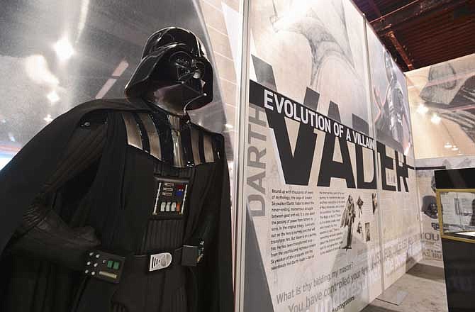 This Thursday, August 8, 2013 publicity photo released courtesy of Disney shows the Darth Vader exhibit at D23 EXPO, Aug. 9-11, 2013, a three-day celebration for fans of all things Disney held at the Anaheim Convention Center in Anaheim, Calif.