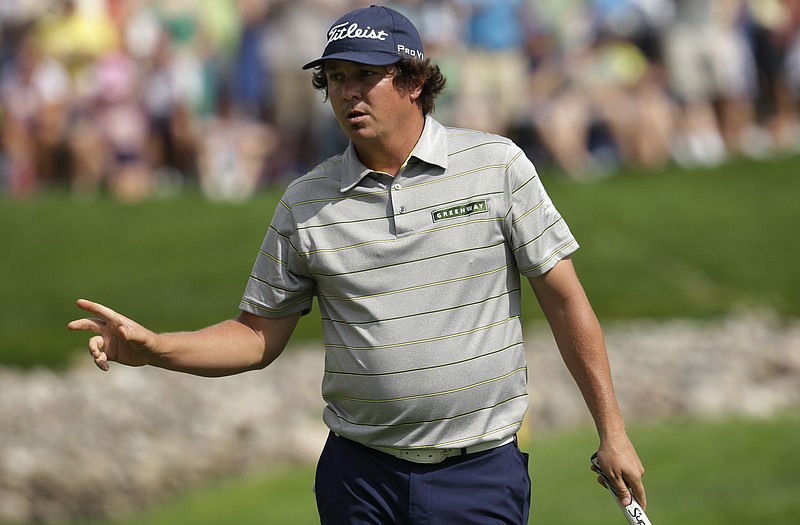 Jason Dufner acknowledges the crowd after a birdie on the 11th hole during Friday's second round of the PGA Championship at Oak Hill Country Club in Pittsford, N.Y.