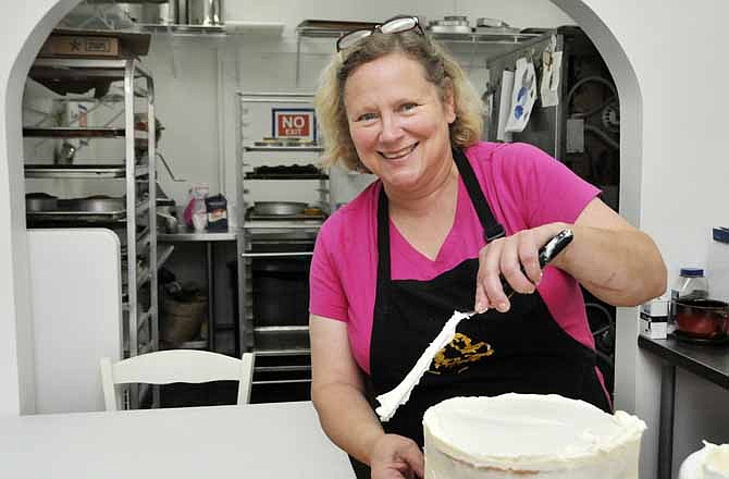 Even though she's no longer a familiar fixture on Jefferson City's High Street, Chez Monet's Joan Fairfax is still busy creating delicious confections in her now home-based business. She's grateful to her brother, Tim Schroeder, for updating electrical components of the house so she could have heavy duty ovens at her disposal. 