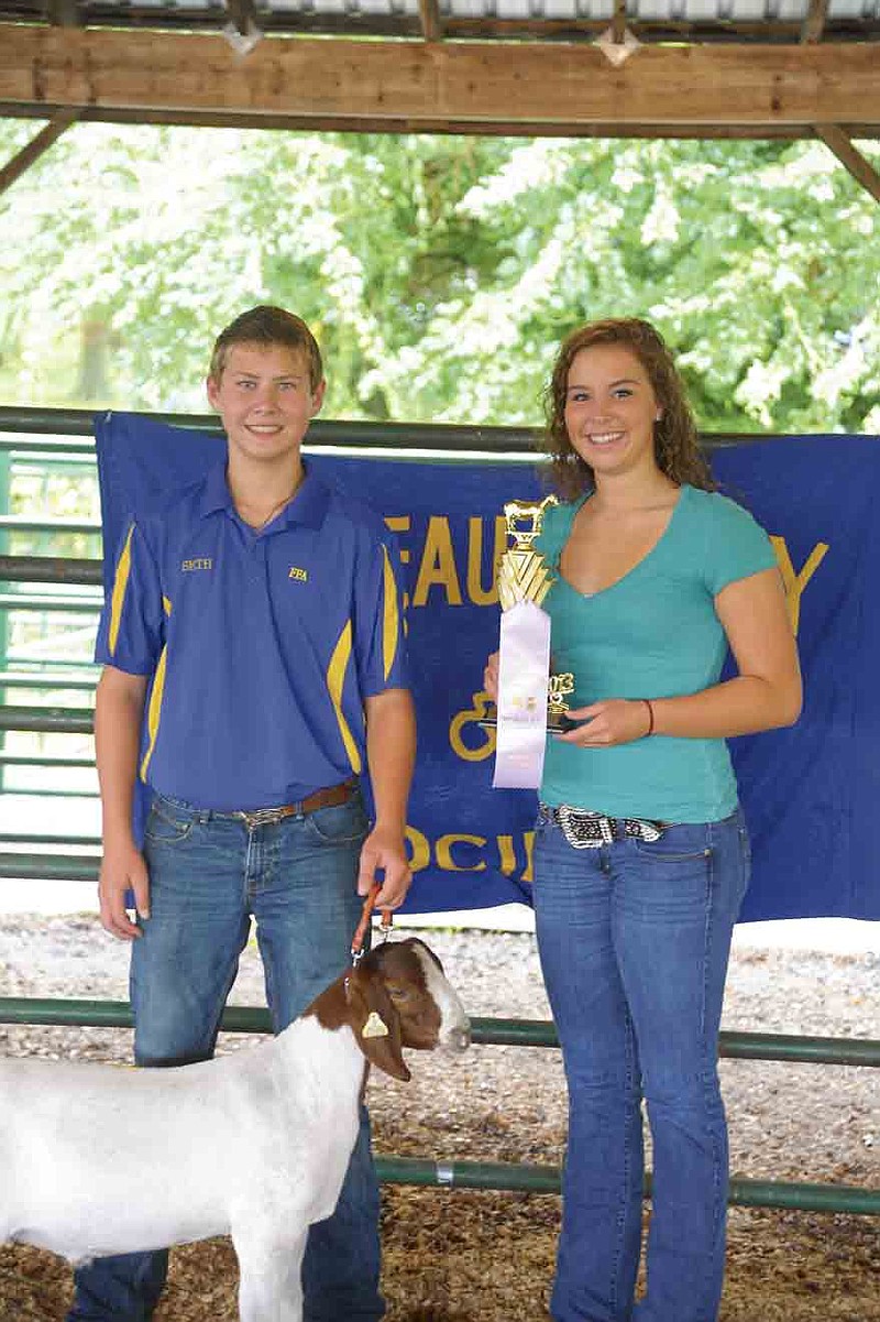 Seth Kuda's market goats took both Grand Champion and Reserve Grand Champion Tuesday, Aug. 6. Democrat photo/Michelle Brooks