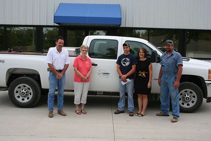 An AGC of Missouri Young Executives Club Vo-Tech Scholarship of $1,500 was presented  to Jacob Kueffer (center) by Kenny Lehman (far left), Manager, Lehman Construction, LLC  and Kenny Lehman's mother, Dwena Kueffer.  Also pictured for the presentation are  Jacob's parents Toni and Brad Kueffer (far right).   Brad is a foreman at Lehman  Construction, LLC. 