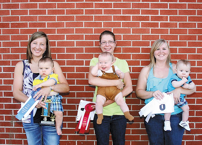 Winners of the Best Baby Boy Under 8 Months category, from left, are: first place, Beau Moreland, 7 months, son of Jill and Chris Moreland, California; second, Caleb Warner, 7 months, son of Kayla and Josh Warner, Prairie Home; and third, Wyatt Dilse, 6 months, son of Stephanie and Brian Dilse, California. 