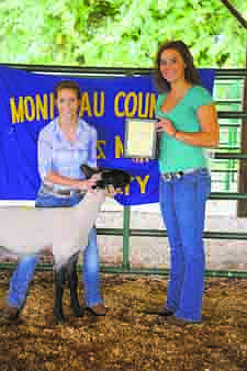 California High School FFA Chapter President Libby Martin took the Senior Showmanship award in the lamb category. Democrat photo/Michelle Brooks